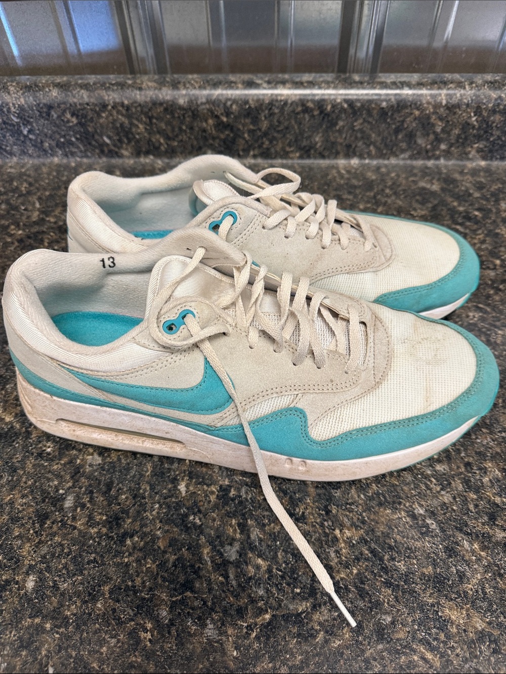 Nike men’s turf White and Teal Low-Top Sneakers